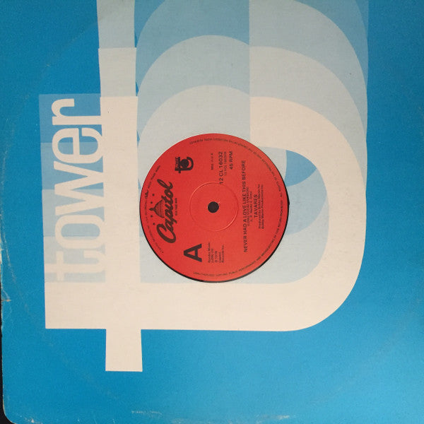 Tavares : Never Had A Love Like This Before (12", Single)