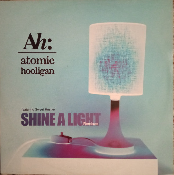 Atomic Hooligan : Shine A Light (Remixes) (12")